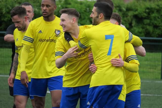 Berkos players celebrate in their win at Edgware Town which secured the runners-up spot. (Picture: Ray Canham)
