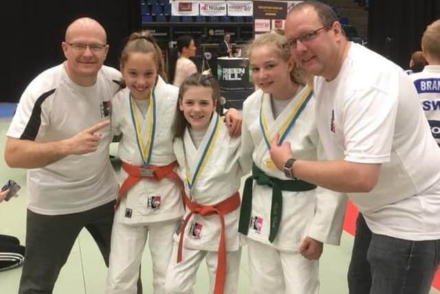 From left, Rush Judos Laurie Rush, Jemima Cadge, Jessica Rush, Nicole Wood and Pete Brent in Sweden.