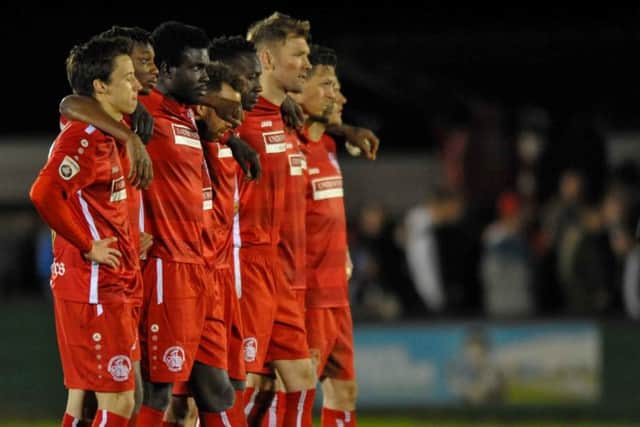 Hemel Town players watching the penalty shootout unfold during last season's playoff defeat. The team will be hoping to go one further this term.