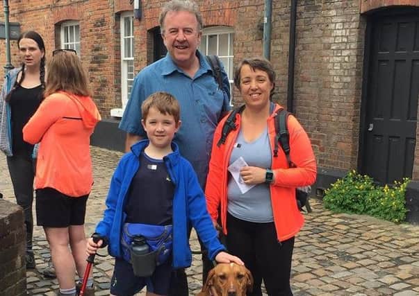 Felix Partridge, eight, and his family