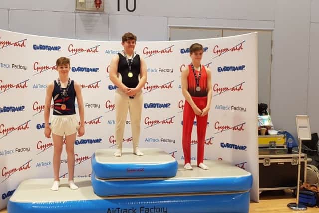 Bronze medal winner Harry Stewart on the podium at Southampton.