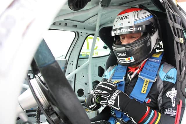 Mike Epps, who lives in Hemel Hempstead, inside his Matrix Motorsport Renault Clio car.
