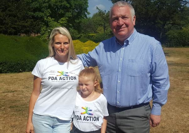 Danielle Jata-Hall with daughter Arijana and Sir Mike Penning MP