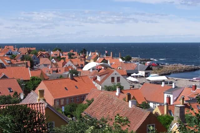 The picturesque red-tiled roofs of Gudhjem is home to Denmark's annual 'Sol Over Gudhjem' cookery competition and its week long food festival.
