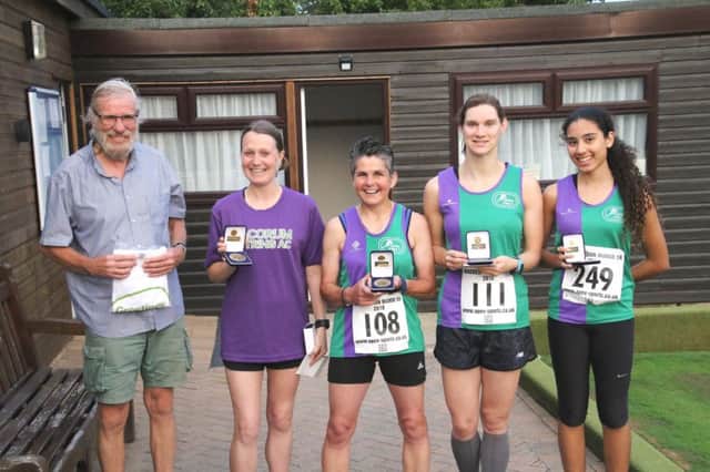 Some of Dacorum & Tring Road Runners medal winners at Waddesdon, from left, John Slack (first in VM70 category), Claire Hallissey (first in VF35 and ninth lady overall), Celia Findlay (first in VF5), Hannah Bennett (third senior woman and eighth lady overall), Indira Patel (first in U17s, fourth lady overall and set a new course record for her age group). Picture by Barry Cornelius.