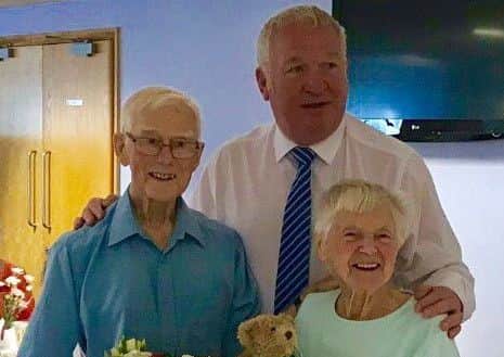 Cedric and Joyce with MP Sir Mike Penning
