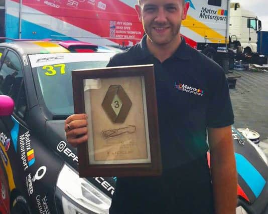 Hemels Mike Epps with his race award after gaining a podium finish for his Matrix Motorsport team in round 11 of the Renault UK Clio Cup at Snetterton, Norfolk, on Sunday. It was Matrixs first-ever podium finish.