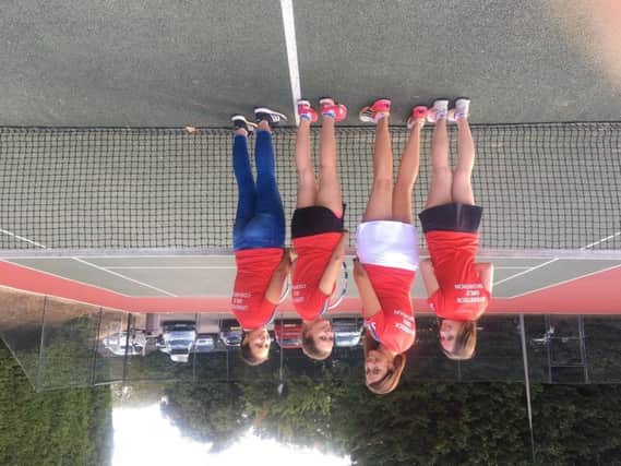 Just four of the 11 female coaches at Leverstock Green Lawn Tennis Club, from left, Molly Rice, Lizzie Ayling, Tessa Cawley and Kirsty Cawley. The 11 ladies will be attempting to break a world record soon.