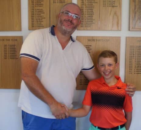 From left, Division One winner Ben Alford with Division Two winner, young Thomas Ashton.