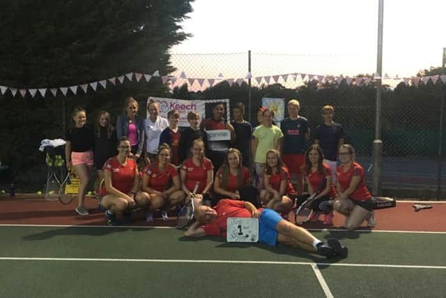 Action from Leverstock Green Tennis Club during their 60-hour coaching marathon.