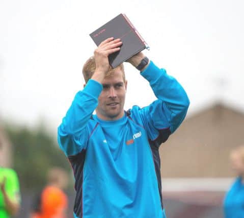 Hemel midfielder Jordan Parkes, applauding the travelling Tudor Army fans in Essex on Saturday, is now clubs co-caretaker boss with Darren Ward.