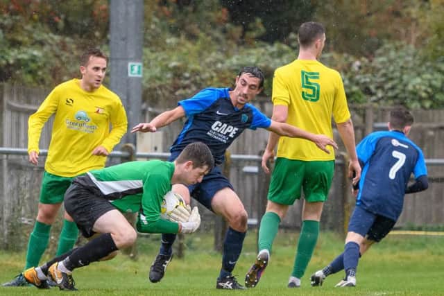 Tring Athletic in action against Arlesey Town earlier this season. (File picture: Guy Wills).