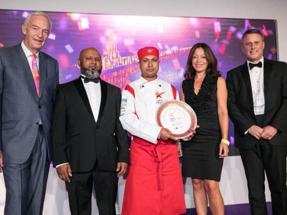Chef Ansar Miah collects his award
