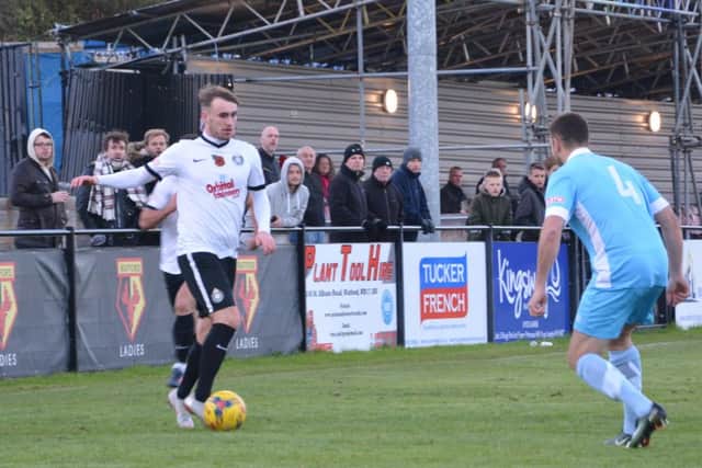 Kings Langley's Luke Wade-Slater, left, hit a 25-yard blast to put his side 2-1 up against Weymouth on Saturday. (File picture by Chris Riddell).