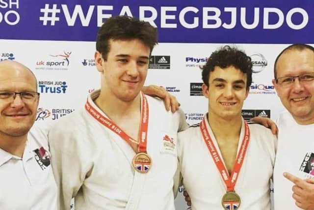 Rush Judo coaches Laurie Rush and Pete Brent with BJA national championship medallists Tom Lish and Michael Fryer.