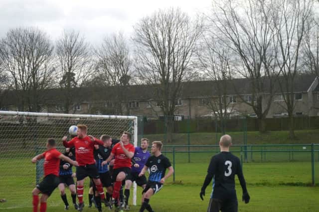 Boxmoor defend their lead against AFC Aylesbury in BSFL's Division One on Sunday.