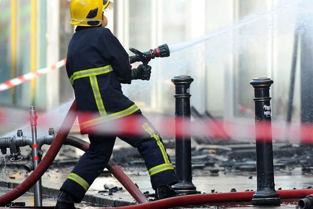 How do the fire and rescue service respond to an emergency