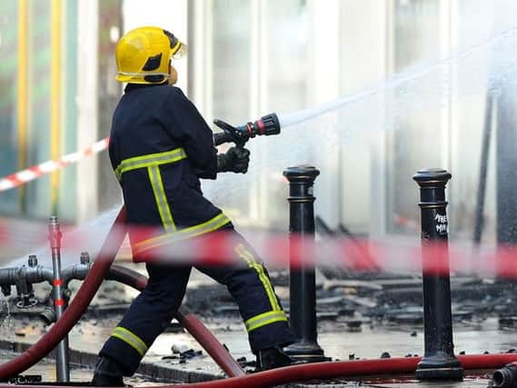 How do the fire and rescue service respond to an emergency