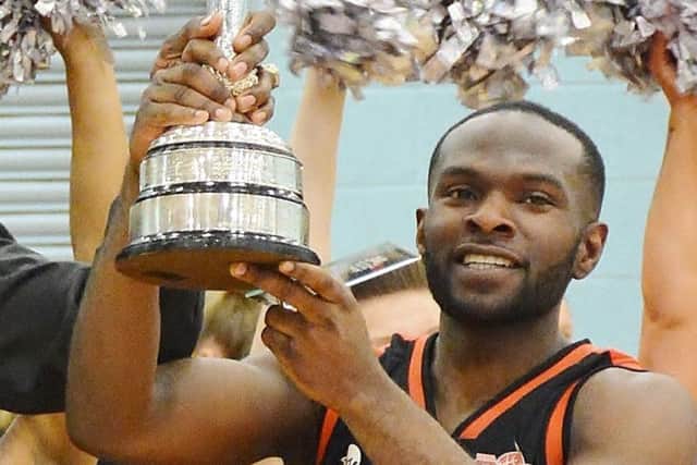 Storm captain Bode Adeluola with the National Cup trophy Hemel won last season. (File picture by Lin Titmuss).