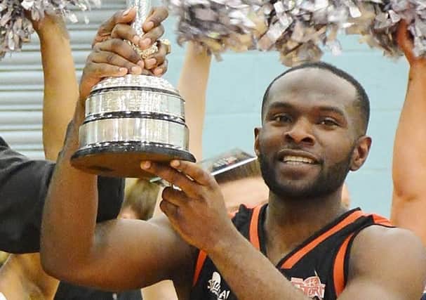 Storm captain Bode Adeluola with the National Cup trophy Hemel won last season.  (File picture by Lin Titmuss).