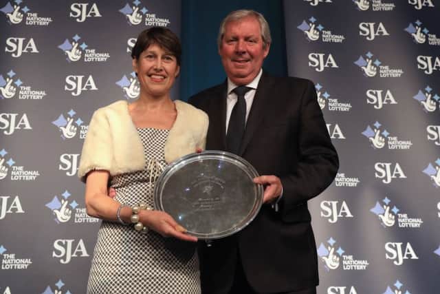 Vikki Orvice presenting The JL Manning Award for services to sport to Brendan Foster during The SJA British Sports Awards 2017 (Photo by Andrew Redington/Getty Images)