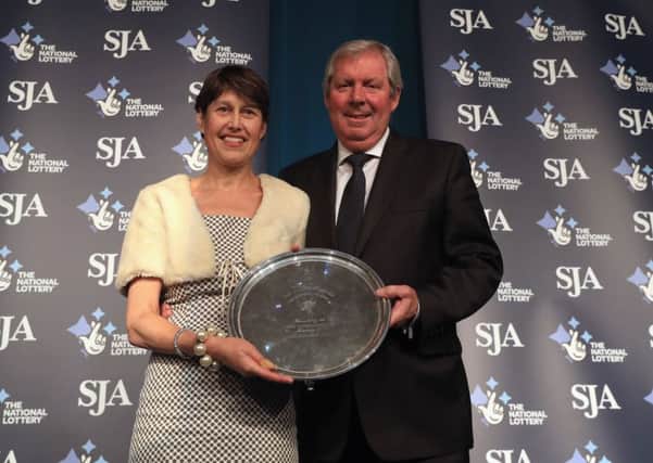 Vikki Orvice presenting The JL Manning Award for services to sport to Brendan Foster during The SJA British Sports Awards 2017 (Photo by Andrew Redington/Getty Images)