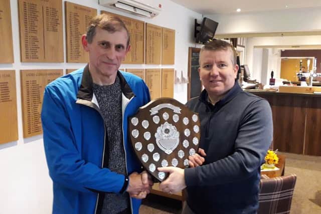 From left, Brian Ridgeway receiving the Alan Irwin Shield 2019 from event organiser Martin Bull at Little Hay Golf Club.