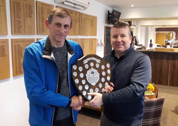 From left, Brian Ridgeway receiving the Alan Irwin Shield 2019 from event organiser Martin Bull at Little Hay Golf Club.