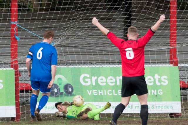 Tring Athletic in action earlier this season during another victory.