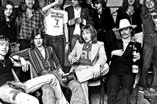 Magenta Devine pictured second from the right on the top row - backstage at a Mott The Hoople Friars performance