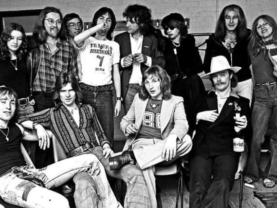 Magenta Devine pictured second from the right on the top row - backstage at a Mott The Hoople Friars performance