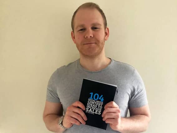 James Berg with his new book