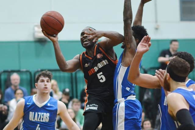 Hemel Storms Bode Adeluola finds a way through the crowd against Derby Trailblazers on Saturday. (Picture by Lin Titmuss)