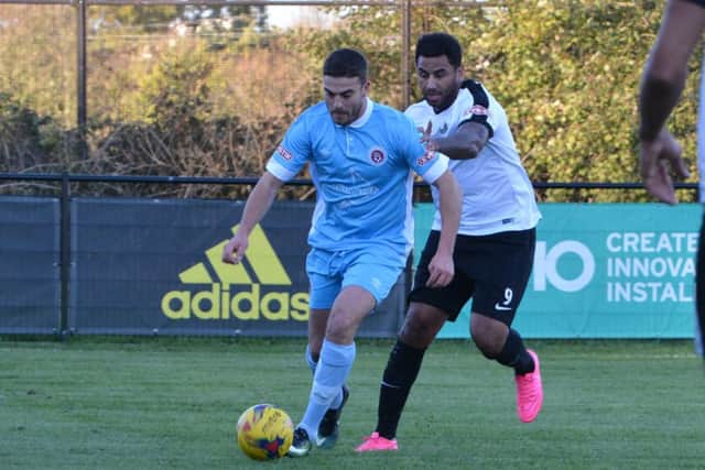 Kings striker Rene Howe, right, helped his side with a man of the match performance against Tiverton on Saturday. (File picture by Chris Riddell)