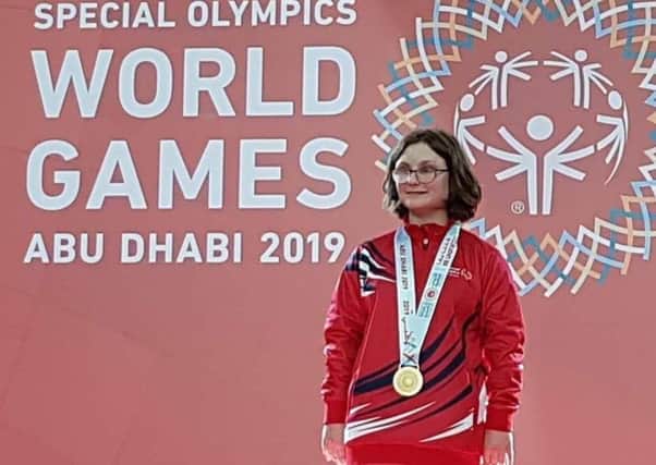 Skye Westwood on the podium with her gold medal in Abu Dhabi.