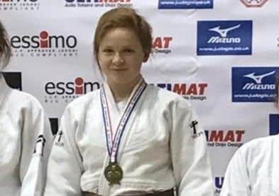 Gold medallist Beth OConnor on top of the podium.