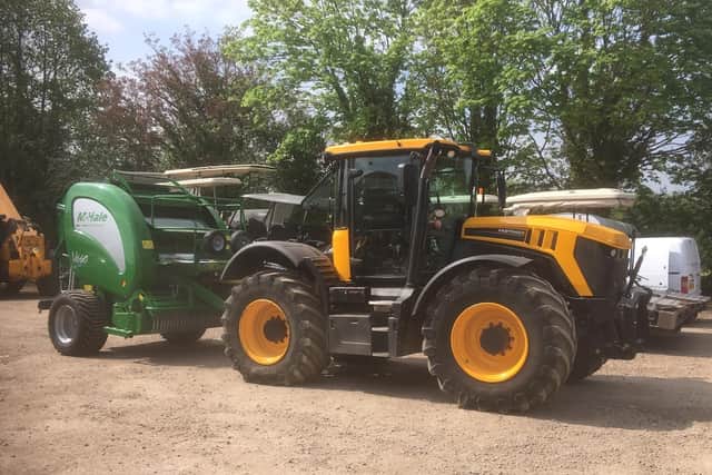 Have you seen this tractor and green baler?