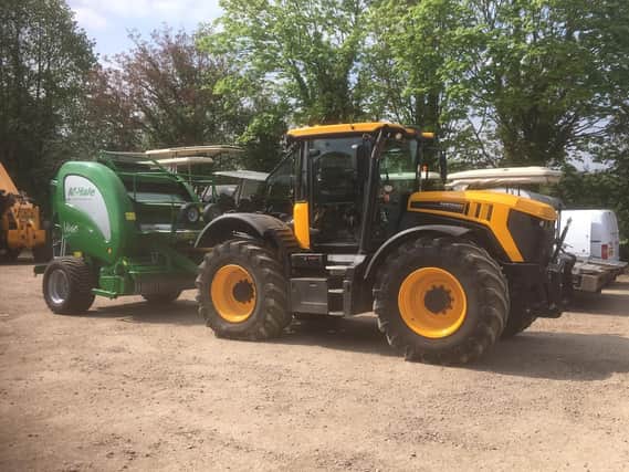Have you seen this tractor and green baler?