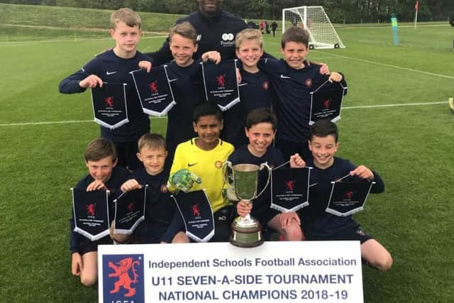 Berkhamsted Prep U11s were presented with their national championship medals by former West Ham star striker Marlon Harewood.
