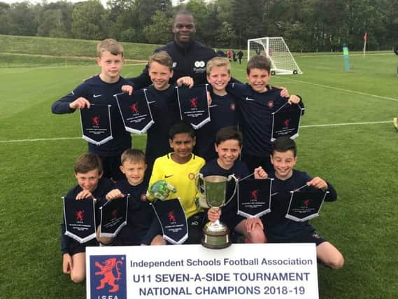 Berkhamsted Prep U11s were presented with their national championship medals by former West Ham star striker Marlon Harewood.