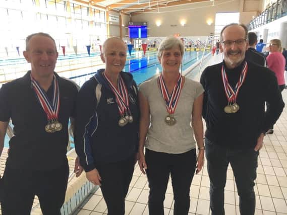 Hemel Hempstead Swimming Club medal winners poolside at the Norfolk Masters Long Course Open held at Norwich University earlier this month.