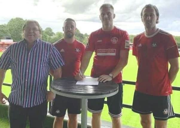From left, Hemel Town chairman Dave Boggins, ambitious new manager Sammy Moore, new signing Mitchell Dickenson and assistant manager Jack Midson.