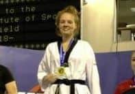 Chloe Dutton tops the medal podium in Sheffield last autumn.