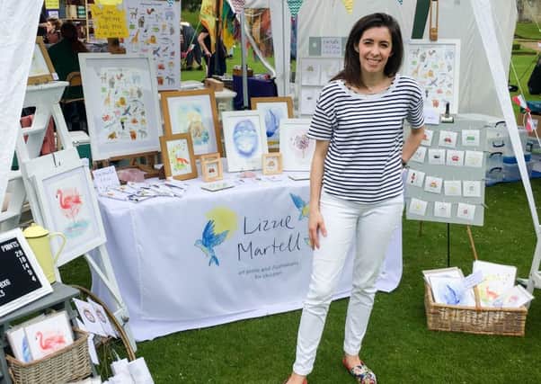 Lizzie Martell at her stall at the Hospice of St Francis Garden Party this year.