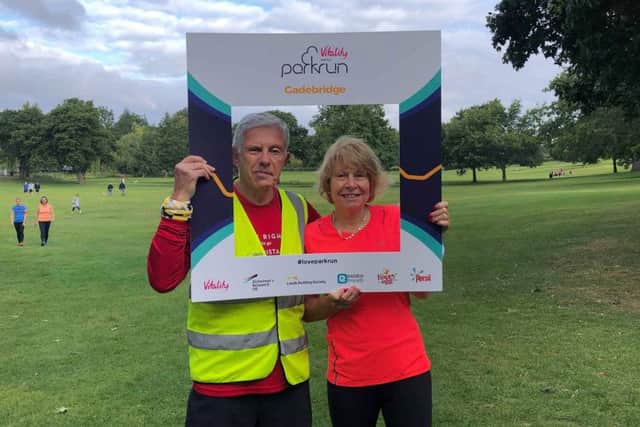 Harrier Peter Tucker after completing his 100th 5km Parkrun, with wife Nikki, who also completed in the event at the weekend.