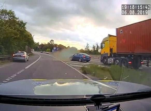 The car smashed into a lorry on the main carriageway. Credit: Suffolk Constabulary