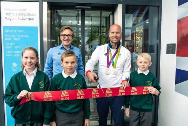 Olympic medallist Richard Hounslow cutting the ribbon