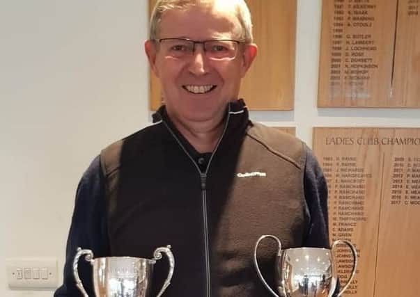 Double-winner Paul Mudd with the Senior Cup and Net Younger Senior Cup at Little Hay Golf Club.