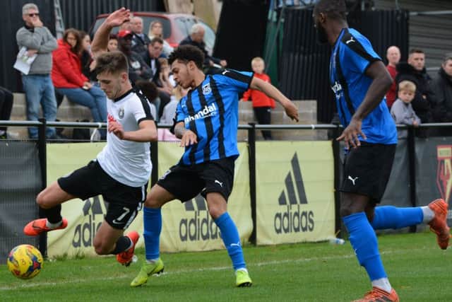 Charlie Pattison, left, in action for Kings Langley against Stourbridge earlier this season. (File picture by Chris Riddell).