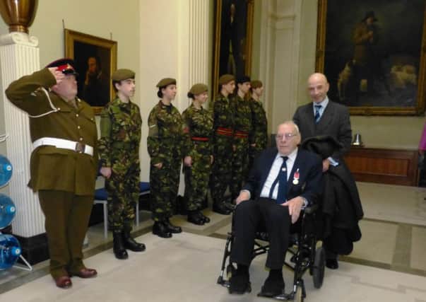 Dennis Marshall receives a British Empire Medal for his decades of service to judo in Dacorum.